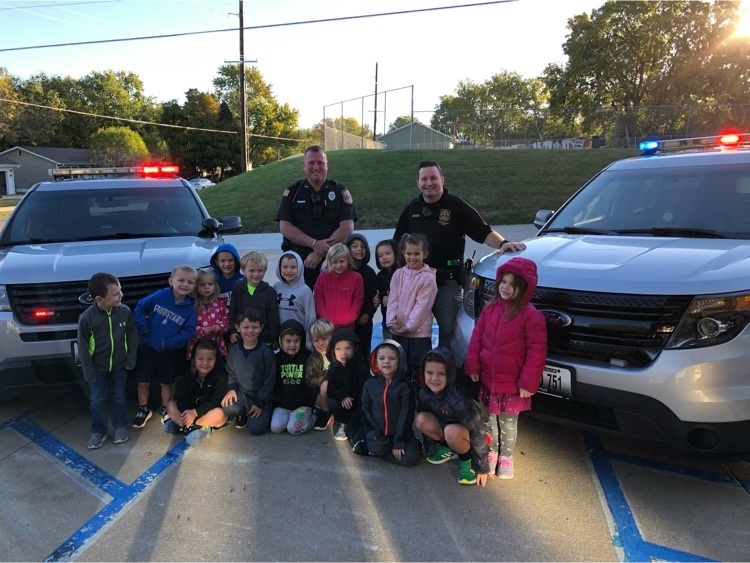 Preschoolers got an up close look at the police cars! 